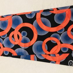 African Wax 6 yards orange blue and black rings and bubles design real African print. Ankanra 100% cotton material.